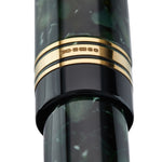 Close-up of the gold cap band hallmark on the Belliver Classic Green